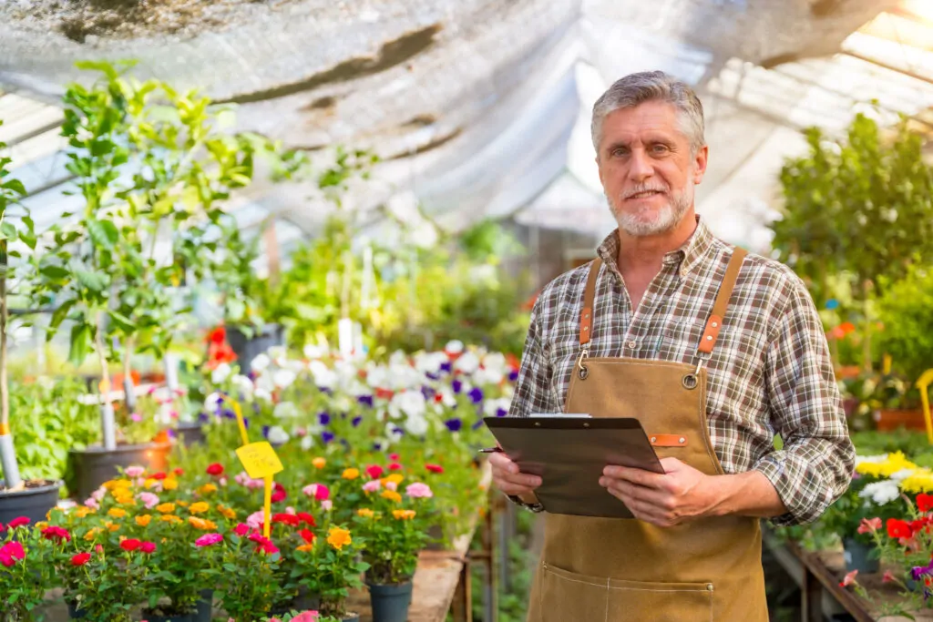 gardener or florist man working in a nursery insid 2024 12 09 01 07 28 utc