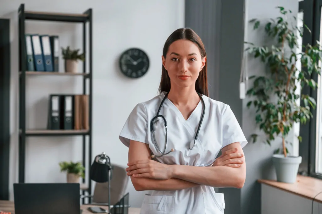 portrait of young beautiful female doctor in white 2023 11 27 05 07 13 utc