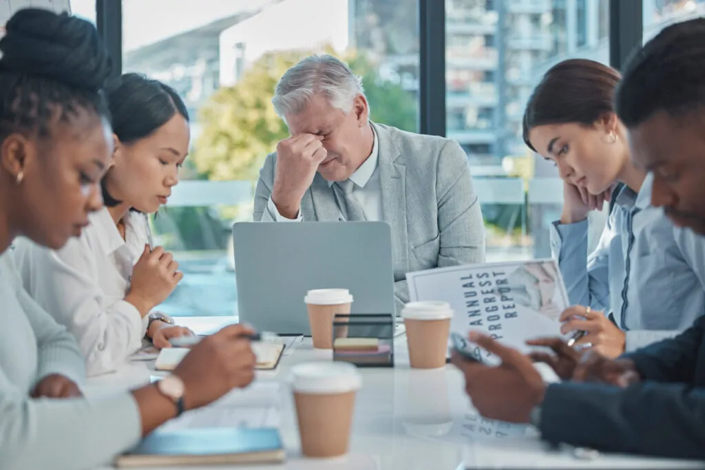 business meeting manager headache and people in s 2026 01 09 09 54 59 utc