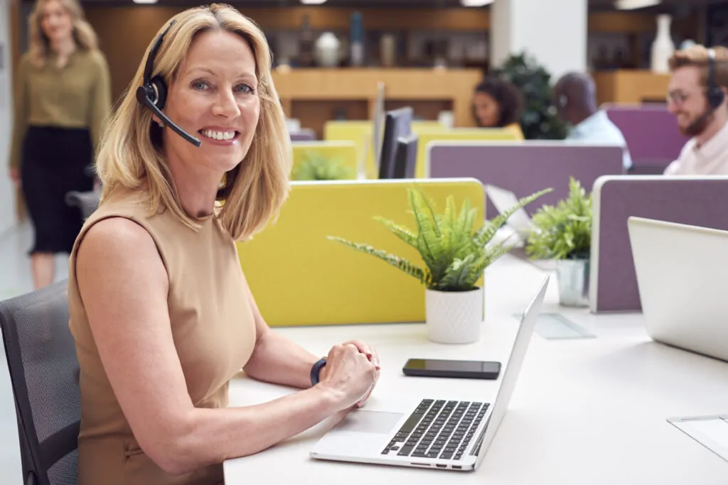 portrait of mature businesswoman wearing phone hea 2026 01 05 22 59 25 utc