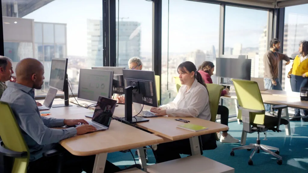 colleagues working with computers in modern office 2026 01 09 12 09 39 utc